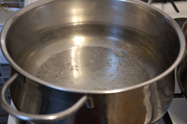 istock Boiling water in cooking pan, close-up view 2242778027