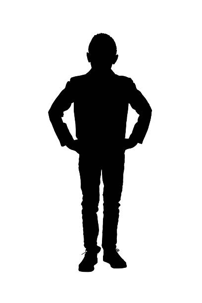 istock silhouette of a front view of a  teen standing and looking at camera dressed with jacket and arms akimbo on white background 2242779187