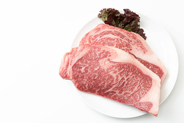 Steak meat on a white plate White background