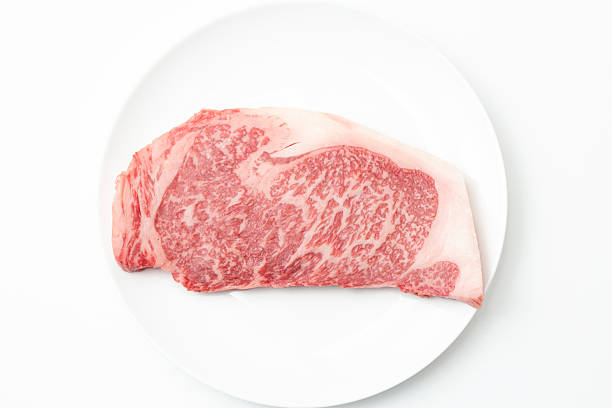 Steak meat on a white plate White background
