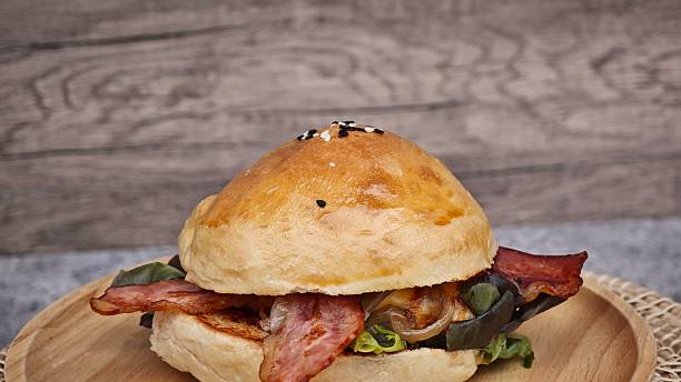 istock BBQ pork burger with cheese and bacon. 2242782306