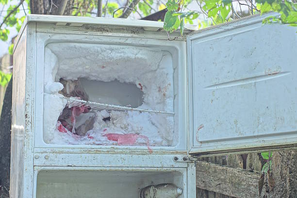 istock part of one old refrigerator with an open freezer compartment 2242789511