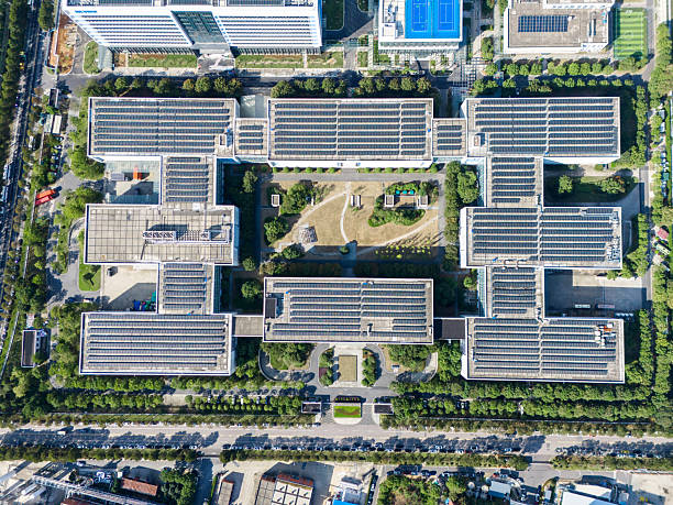 istock Solar panels on factory rooftop 2242791365