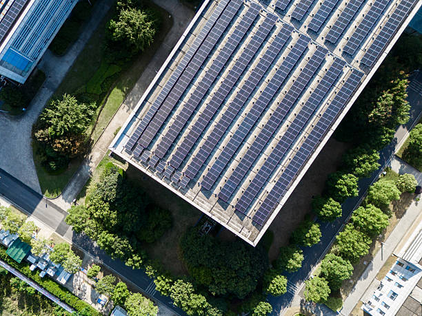 istock Solar panels on factory rooftop 2242791776