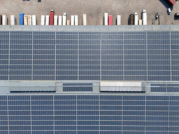 istock Truck loading in warehouse,solar panels on factory rooftop 2242795898