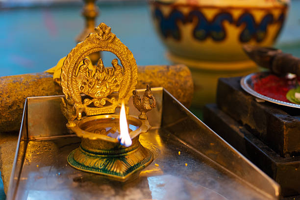 South Indian Hindu wedding ceremony. Traditional Hindu lamp used in rituals and prayers, symbolizing purity, light, and divine energy.