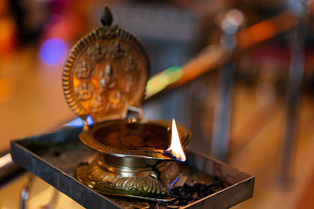 South Indian Hindu wedding ceremony. Traditional Hindu lamp used in rituals and prayers, symbolizing purity, light, and divine energy.