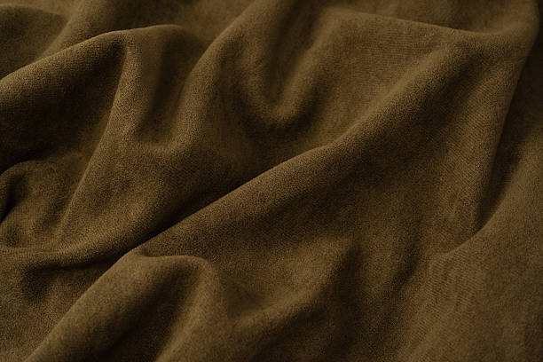 istock Green fabric texture as a background. Top view. 2242796667