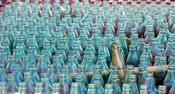 istock Pop bottles ring tossing game at amusement park 2242800665