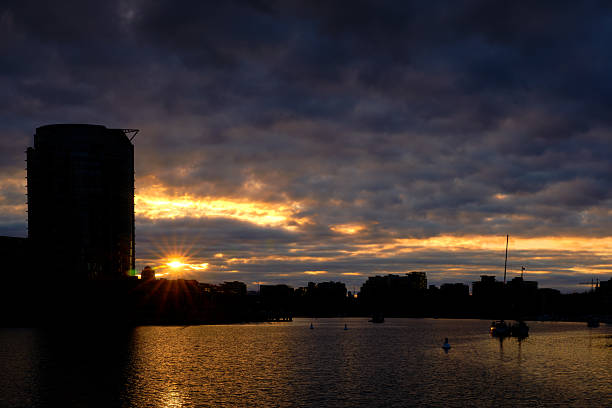 Morning sunrise reflecting off False Creek in downtown Vancouver. British Columbia, Canada.