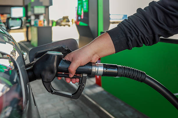 istock Refueling a car at a gas station 2242813600
