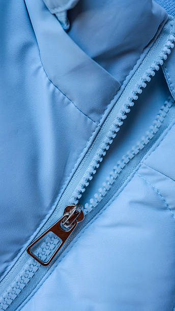 istock Close-up of a blue jacket zipper 2242815272