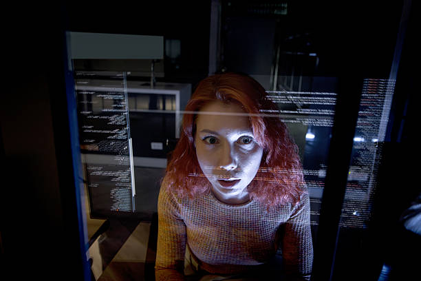 istock Young businesswoman looking at future screen and reading digital information. Thinkful data analyst working with high technology at office. Business statistic staff working with a lot of digital data. 2242818255