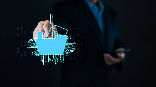 istock businessman uses a stylus and smartphone with a glowing digital folder interface, symbol document management, digital storage, cloud organization, electronic files, and secure data access technology. 2242818460