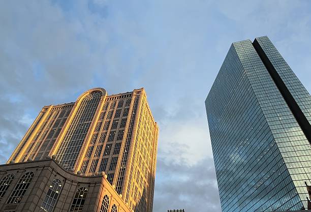 istock Classic and modern skyscrapers illuminated by golden sunset light in Boston. 2242821553