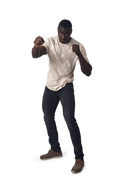 istock front view of man boxing  looking at camera on white background 2242822401