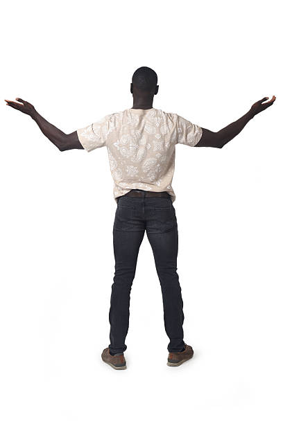 istock back view of a man standing with arms outstretched on white background 2242822402