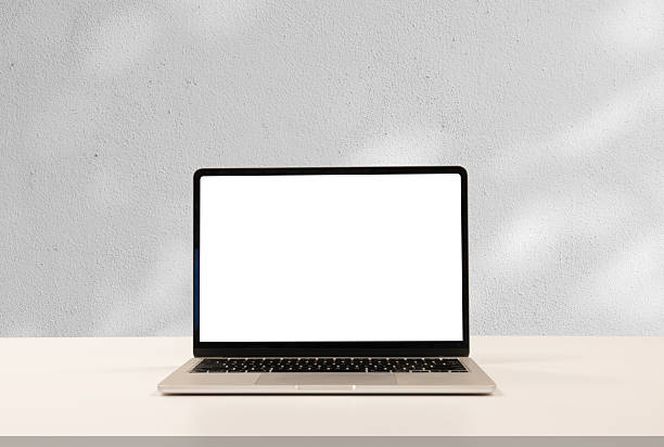 istock close up isolated on blank screen display of laptop computer on table inside beige wall at office room for add content of design banner , website or template or online shopping e-commerce concept 2242822600