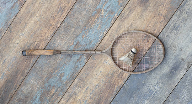 istock old badminton racket on wooden background 2242830703