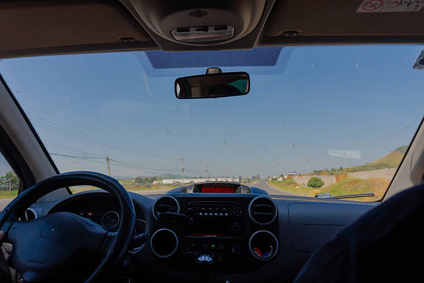 Driver's perspective from inside a car on a road trip