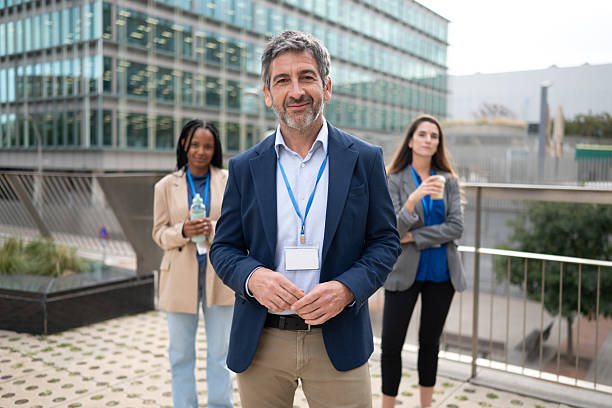 istock Mature adult man smiling leading teamwork 2242836893