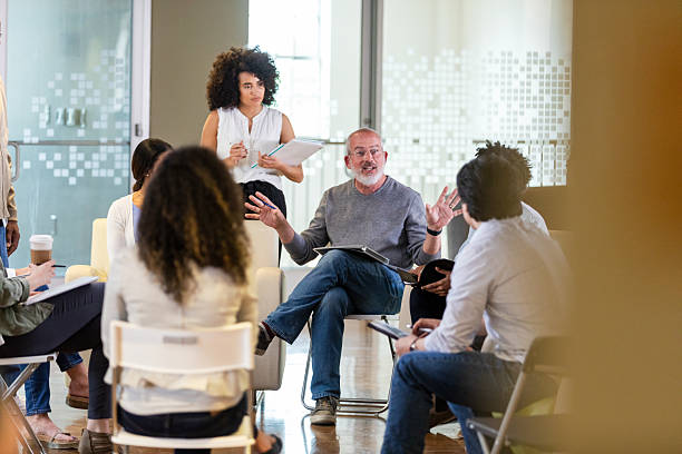 istock Diverse group engages in conversation and learning session, fostering collaboration and connection. 2242840144