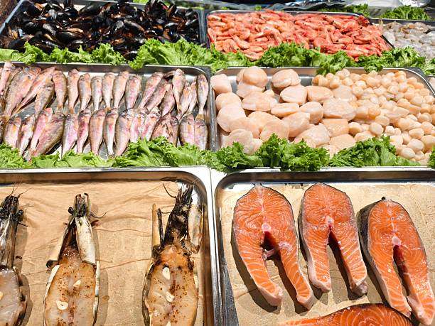 Expensive fresh oysters displayed at a festive market stall at the charming traditional Christmas Market in Zurich, Switzerland