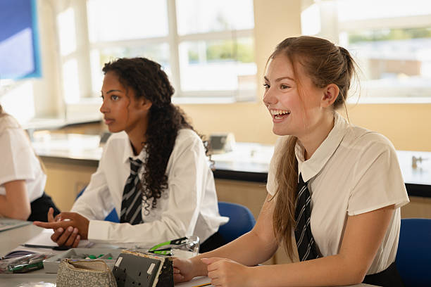 istock High school girls enjoying science lesson 2242842390