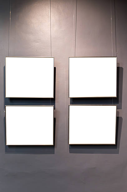 istock Four blank frames hanging on the wall in an Art Gallery 2242843726