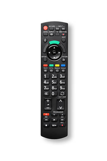 Close-up of a black television remote control with colored buttons on a white background, used for operating home entertainment devices.