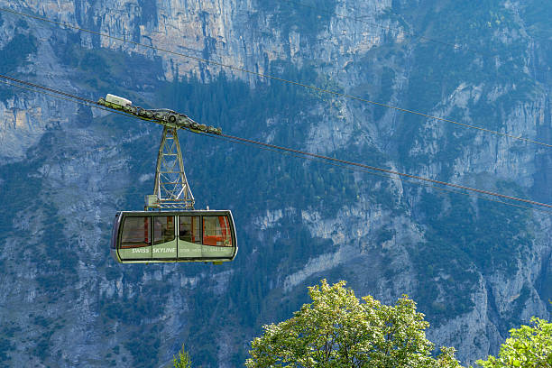 Murren Switzerland - September 30 2025: A Cable Car Going up to Murren Switzerland in the Alps