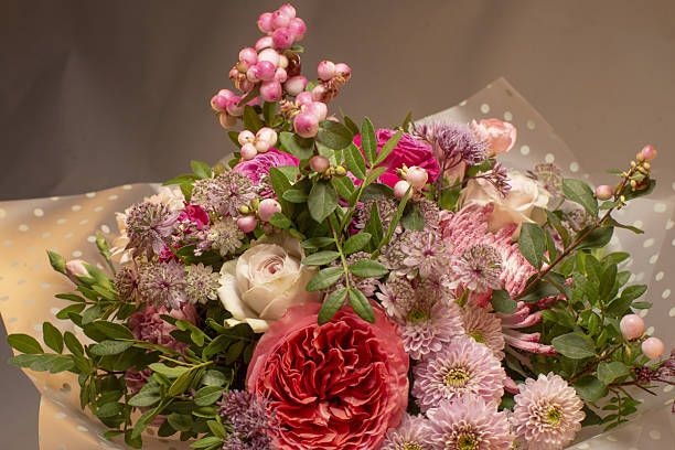 istock A Stunning Bouquet of Various Beautiful Flowers Skillfully Arranged in Wrapping 2242856770