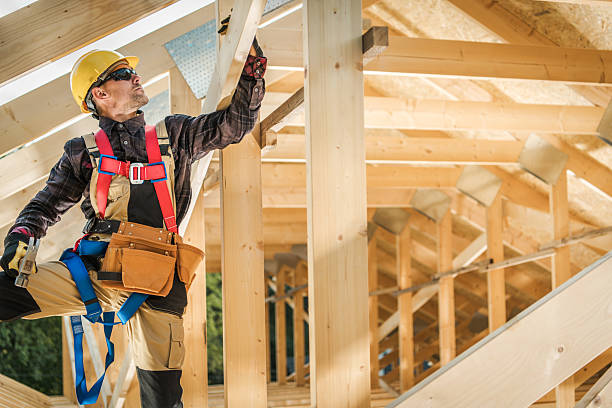 istock A Construction Worker in Safety Gear is Adjusting Beams in a Wooden Structure 2242862405
