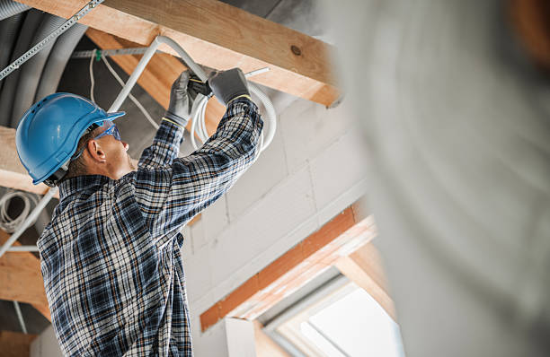 istock Electrician Performing Wiring Installation in a Modern Home Renovation Project 2242862712