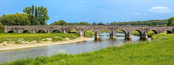 Historic Pont Aubauld Stone Bridge Over Selune River in Normandy