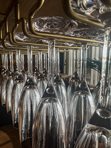 istock Hanging Wine Glasses and Reflections 2242867650