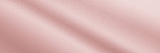 istock Dusty pink rose white silk satin fabric. Elegant background. Light pastel soft gentle delicate. Curtain drapery line. Empty blank design. Wedding birthday Mother's Day Valentine romantic feminine. Wide banner. Panoramic. 2242867915