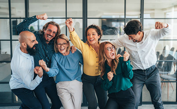 istock Business team celabrating after achieving goals 2242867926