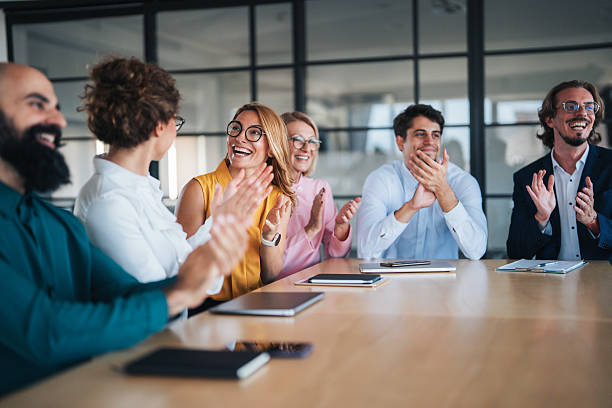 istock Business team applauding success together 2242867981
