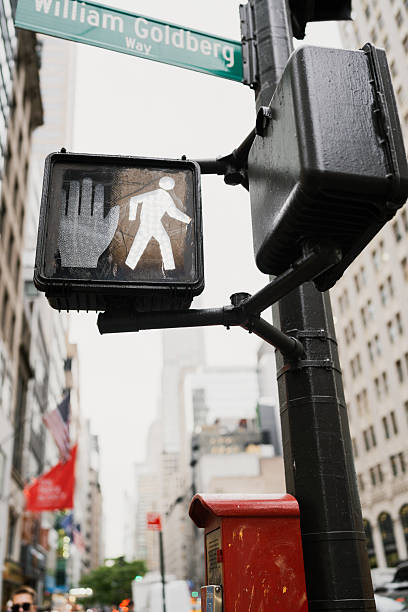 istock Pedestrian crosswalk signal displaying walk and don't walk signs 2242868643