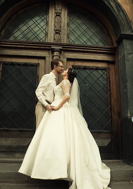 istock stylish luxury bride and elegant groom 2242868871
