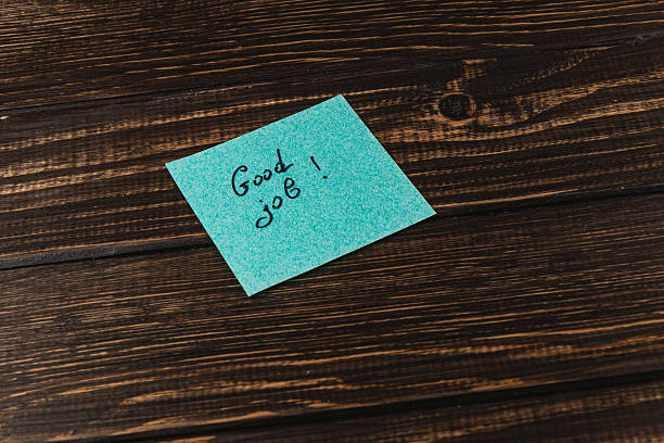 istock Positive message on a sticky note placed on a wooden table 2242873153