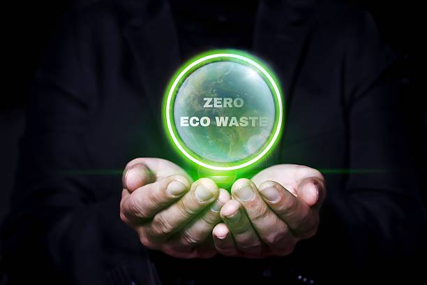 istock Businessman holding zero eco waste planet earth in hands 2242874300