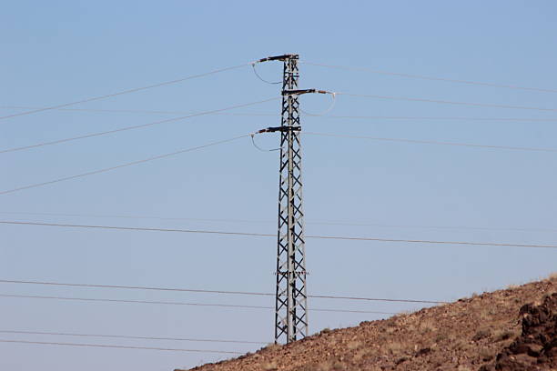 istock Tall electric pole and power lines, line wire, power electrical pole 2242878303