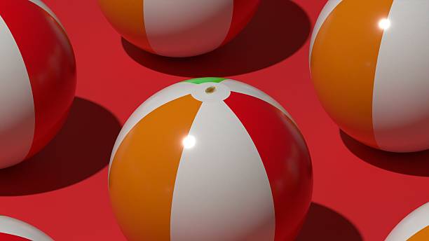 A macro close-up render showing inflatable colorful beach balls on a red-orange surface, capturing reflections and smooth plastic texture for advertising or 3D design visuals.