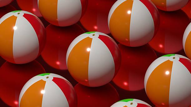 A render showing a cluster of inflatable colorful beach balls on red background, creating lively summer mood and energetic pattern for design use.