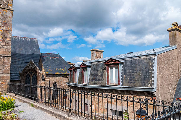 10th. Century Benedictine monks established ramparts and fortifications and soon became a major pilgrimage destination on an island in Normandy, France.