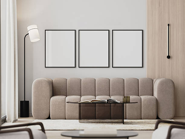 istock Three frames mock-up in modern living room interior with beige sofa and glass coffee table, 3d render 2242881852
