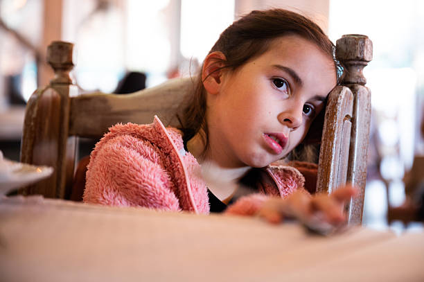 girl sitting on her bed in her bedroom, more with the same model: