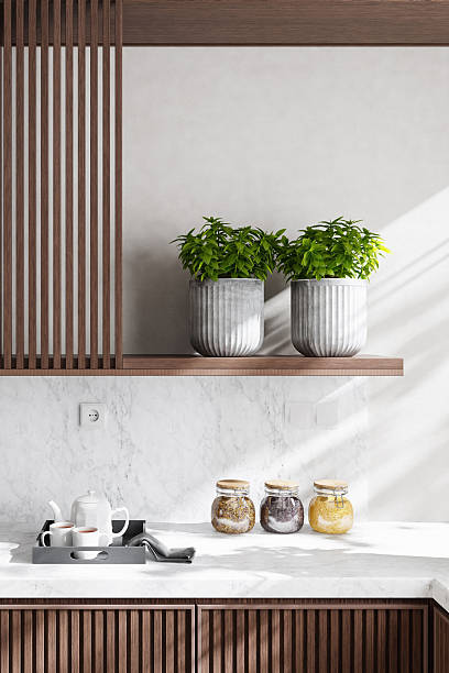 istock Luxury Dark Oak Kitchen with Marble Surfaces and Natural Light 2242885618